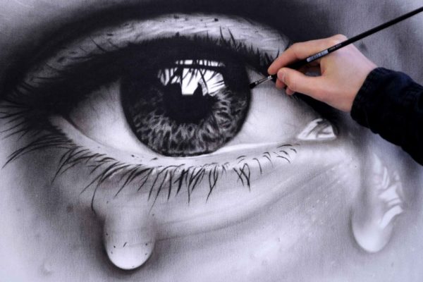 image of painting sad eyes