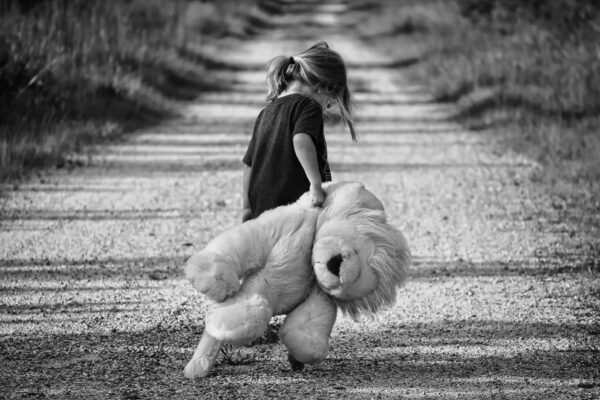 girl holding a toy for scottshak's musing