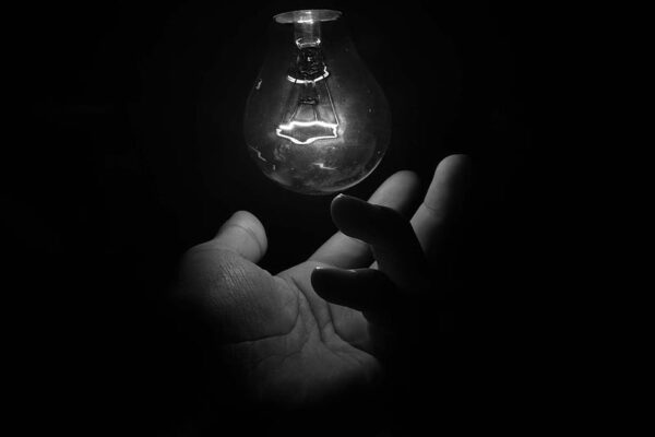 god's hand around a bulb creative photograph for scottshak's short story